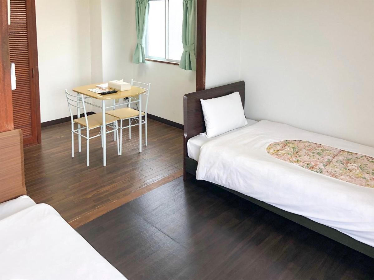 Sunset Hills Inn Naha Extérieur photo