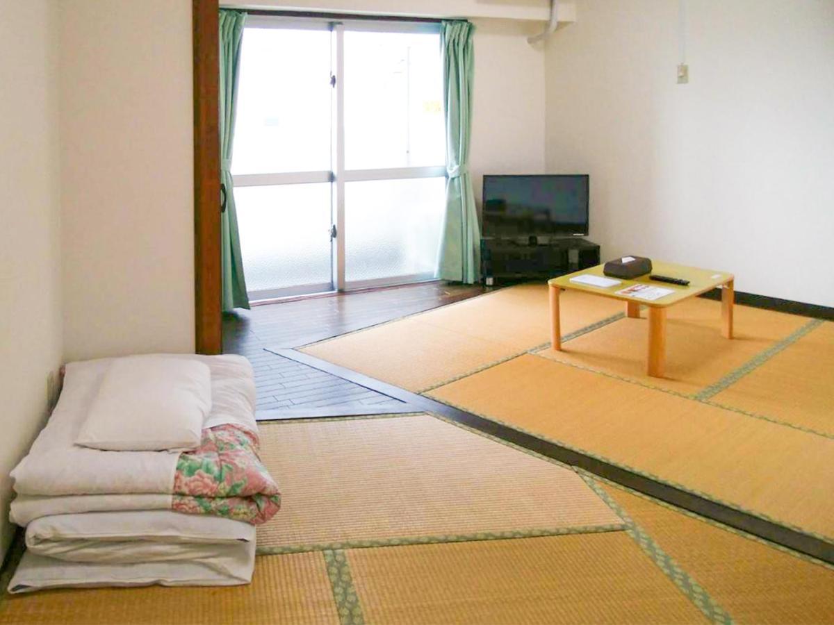 Sunset Hills Inn Naha Extérieur photo