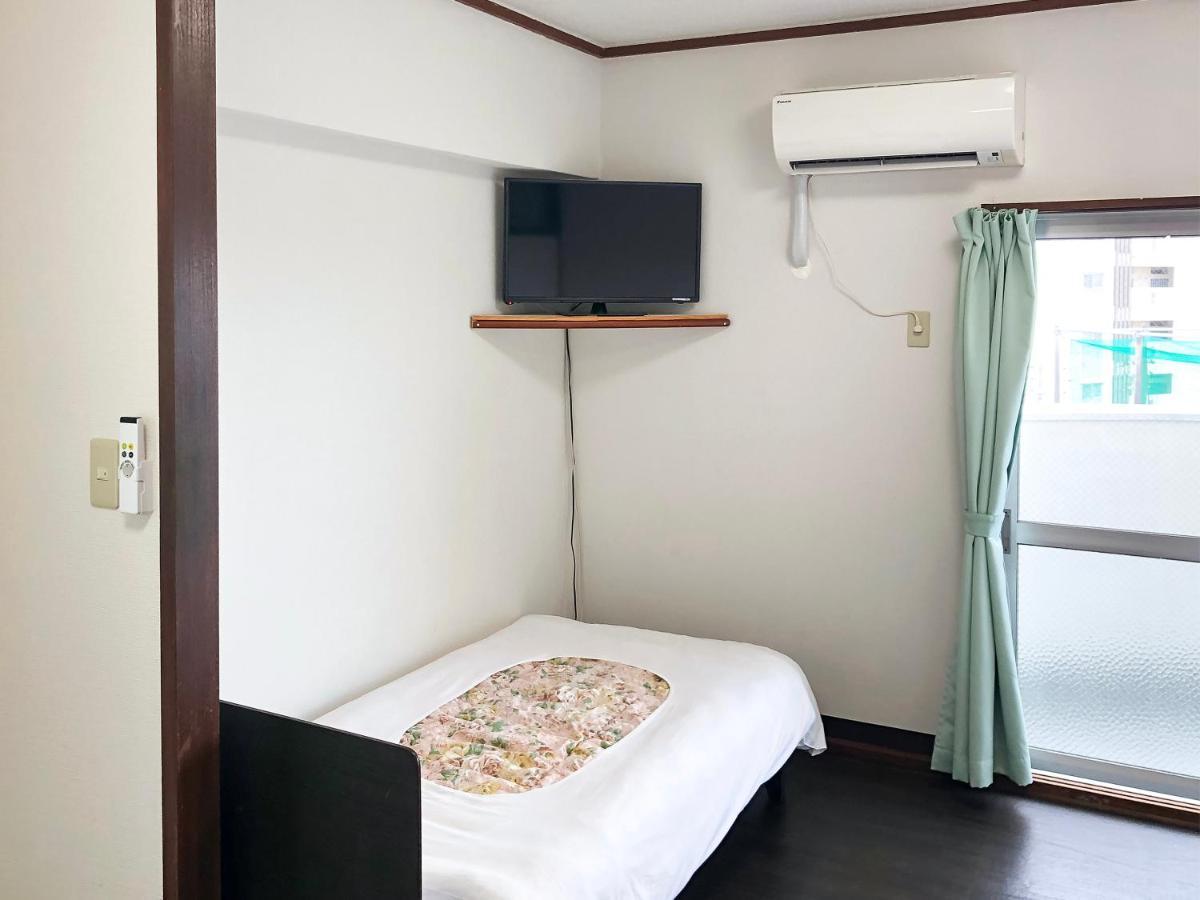 Sunset Hills Inn Naha Extérieur photo