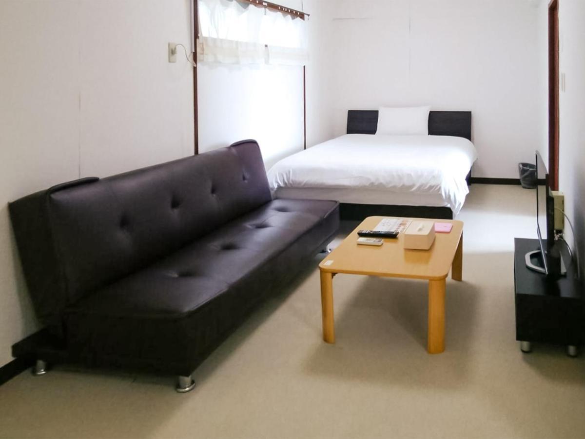 Sunset Hills Inn Naha Extérieur photo