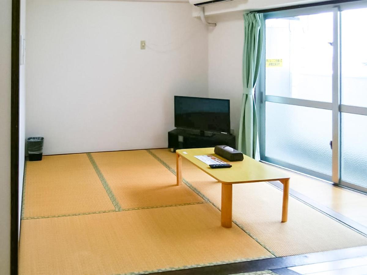 Sunset Hills Inn Naha Extérieur photo