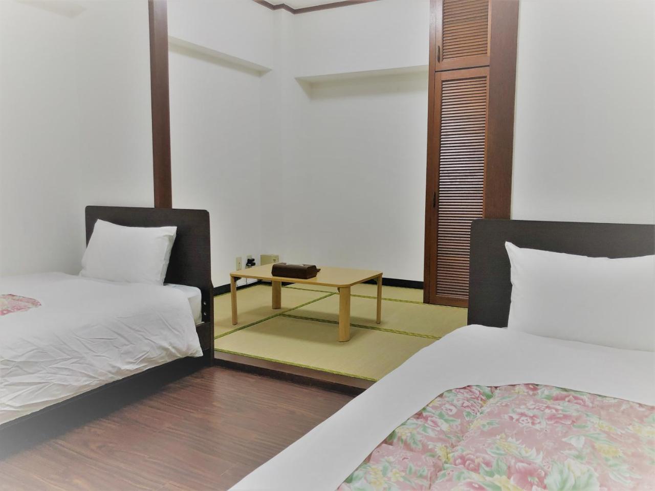 Sunset Hills Inn Naha Extérieur photo