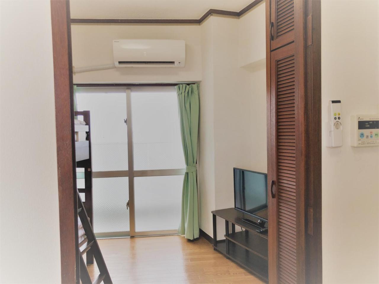 Sunset Hills Inn Naha Extérieur photo