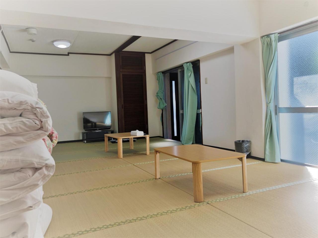 Sunset Hills Inn Naha Extérieur photo