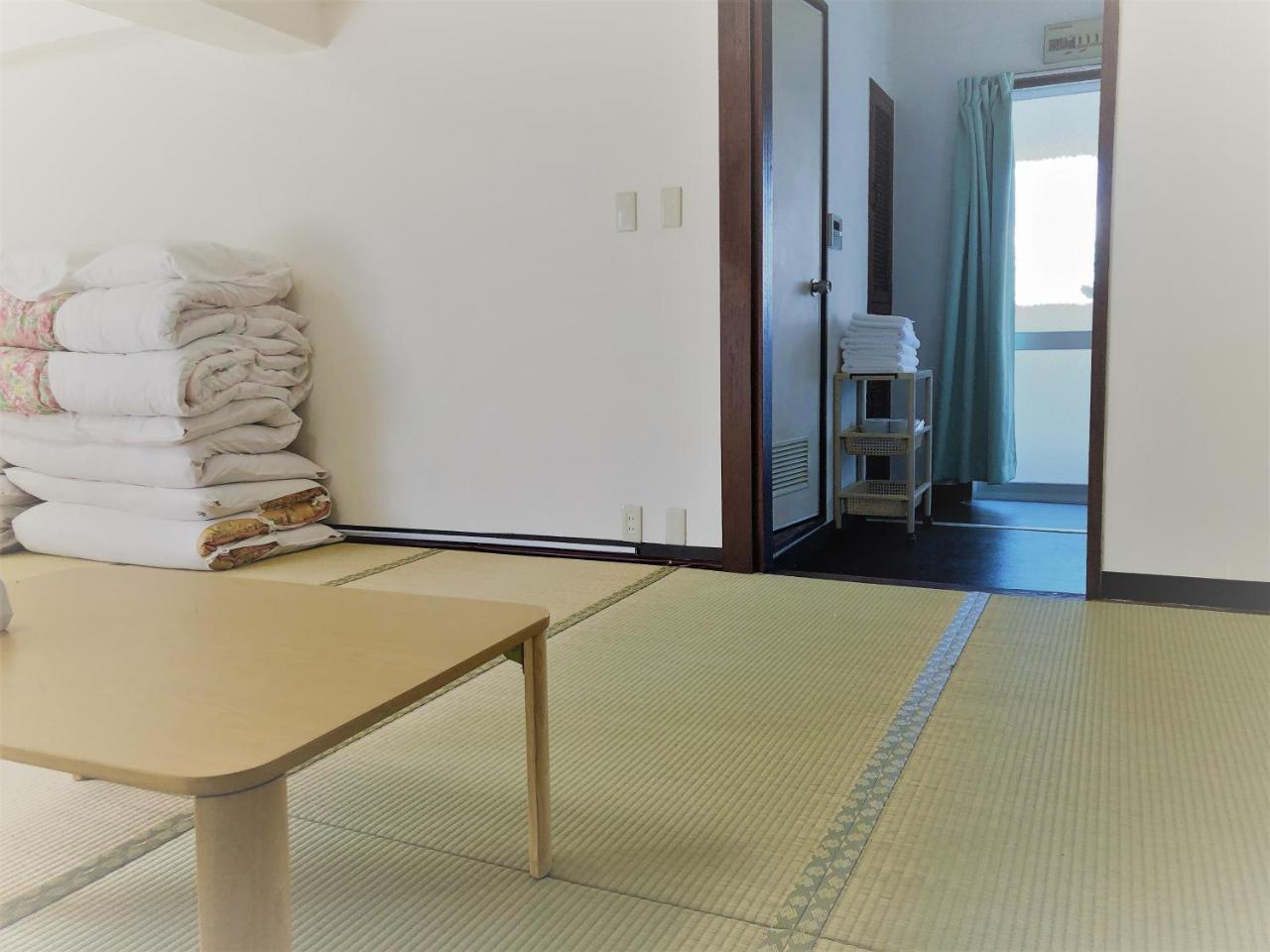 Sunset Hills Inn Naha Extérieur photo