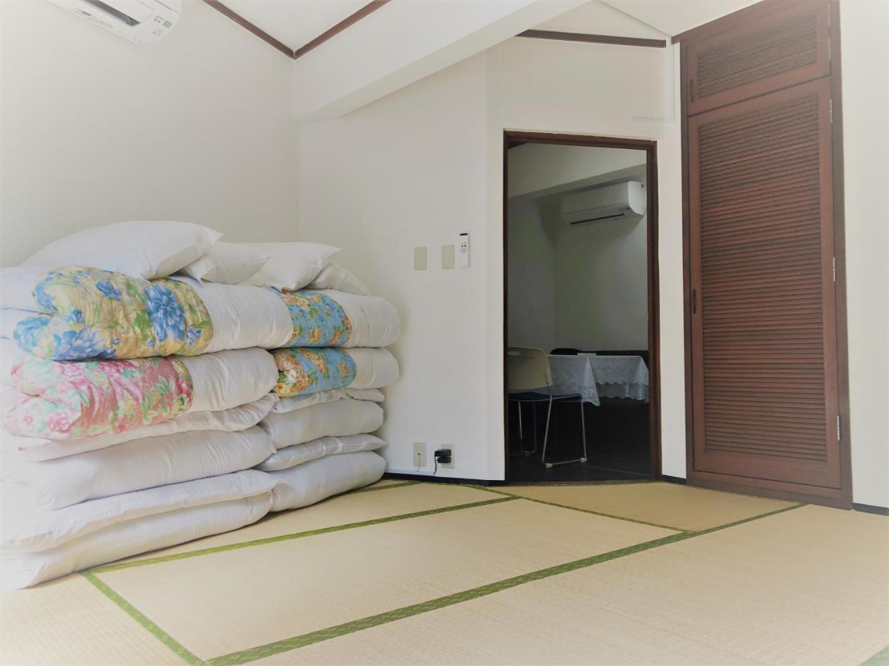 Sunset Hills Inn Naha Extérieur photo